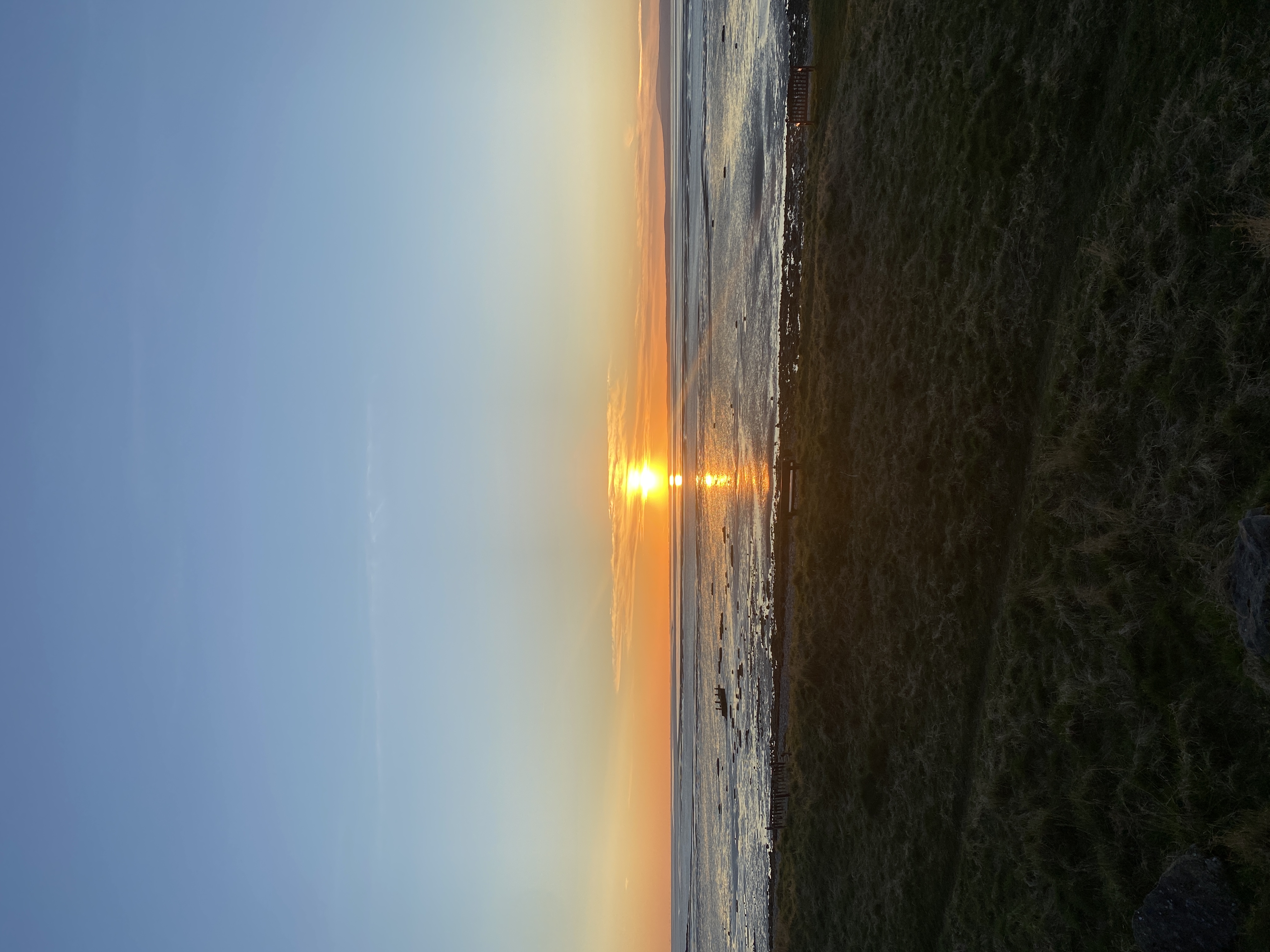 A sunset along the coast of Morecambe Bay at Hest Bank. 