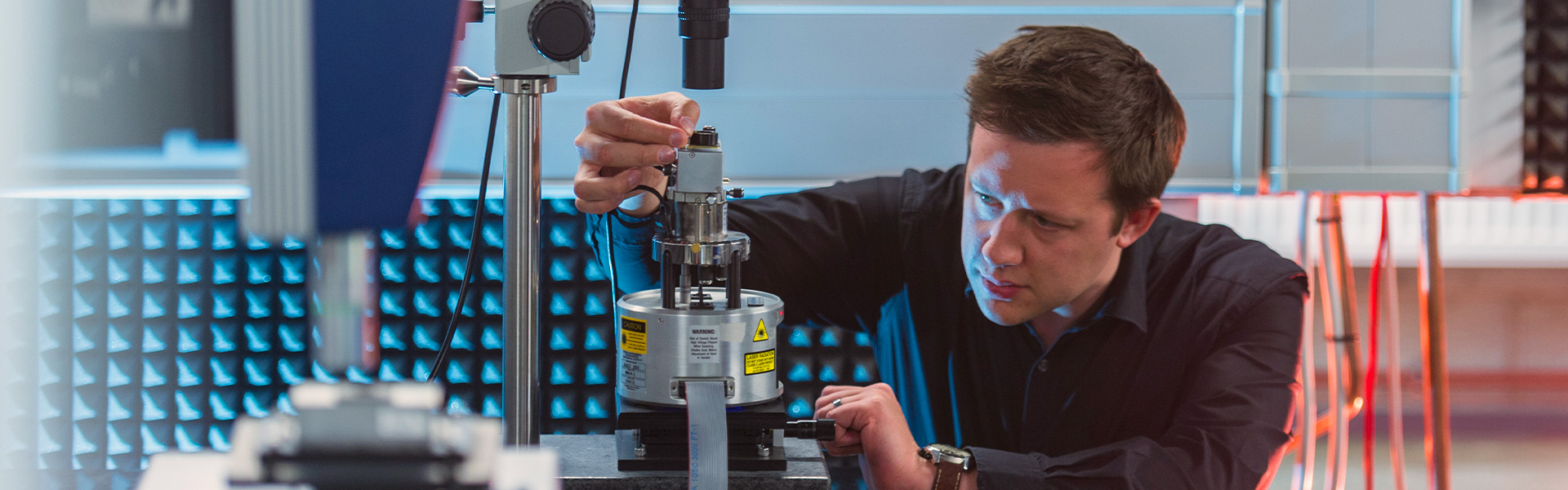 A man checking the laboratory equipment