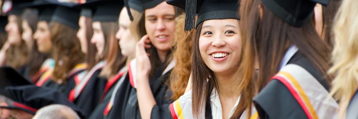 Image of students in Lancaster University graduation robes