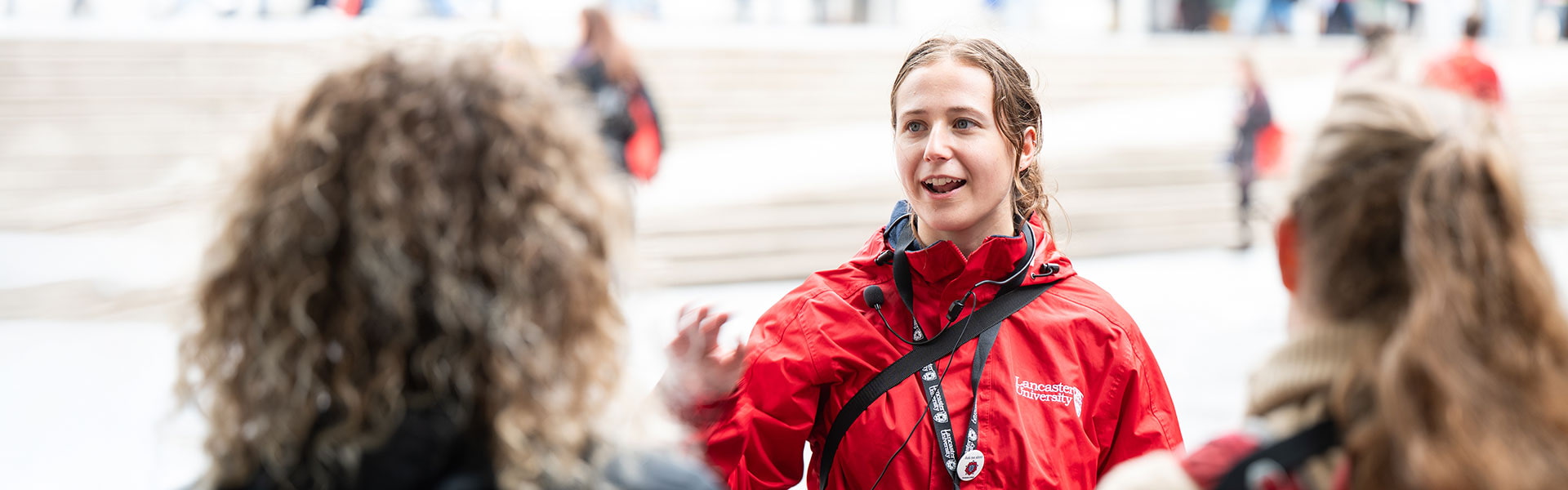A student ambassador answering questions at an open day
