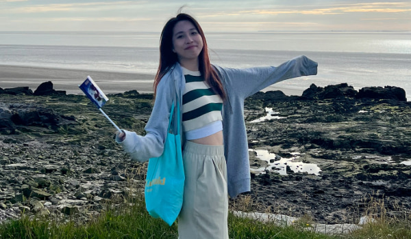 Student Skylar Qu at the seaside